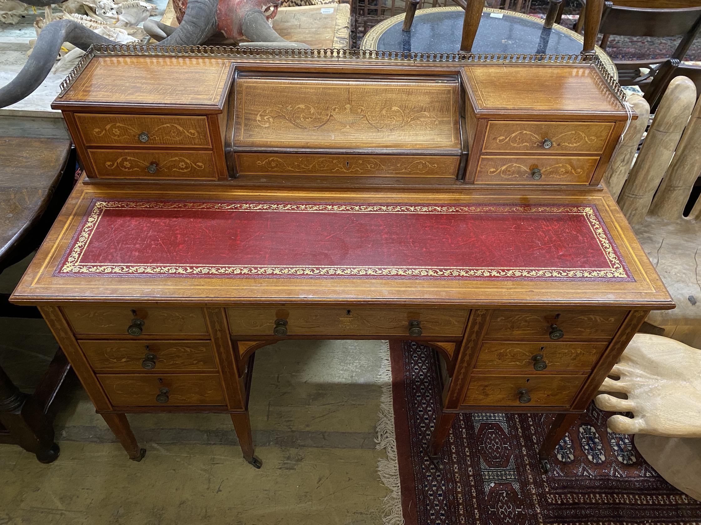 An Edwardian Edwards & Roberts Sheraton Revival satinwood banded marquetry inlaid mahogany kneehole writing desk, width 122cm, depth 60cm, height 95cm